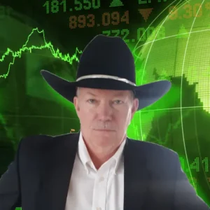 Mark Willet in front of stock market with bull background